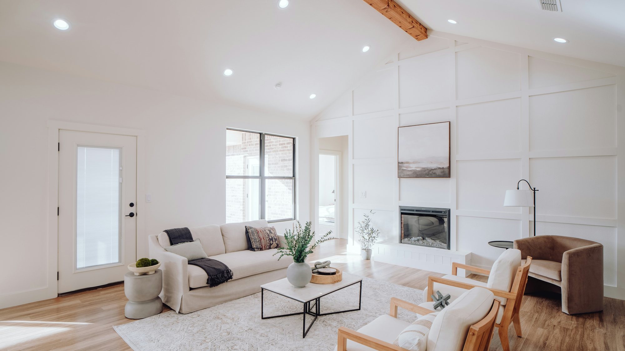 A bright living room with an ivory sofa